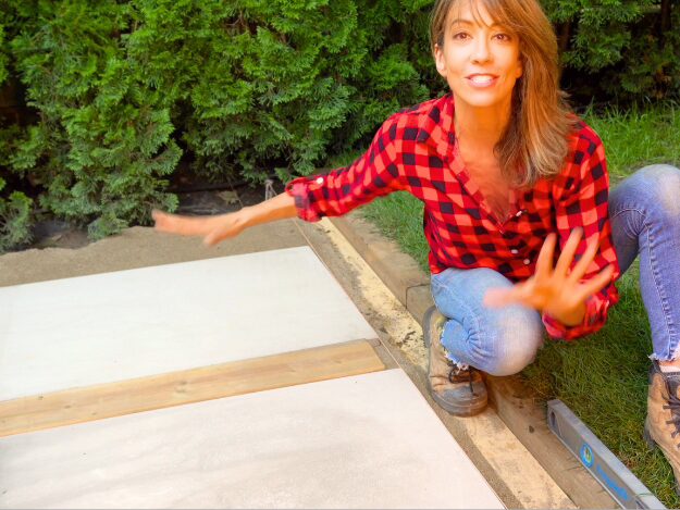 Daru installing a paver walkway 