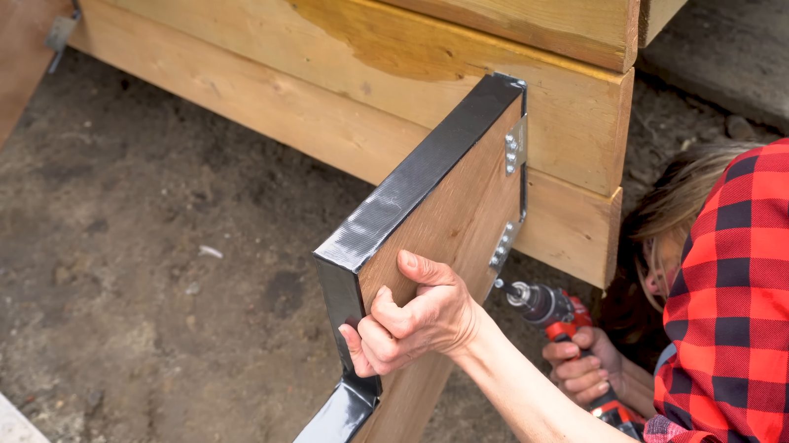 Installing the Simpson Strong-Tie stringer connector at the top of the stringer